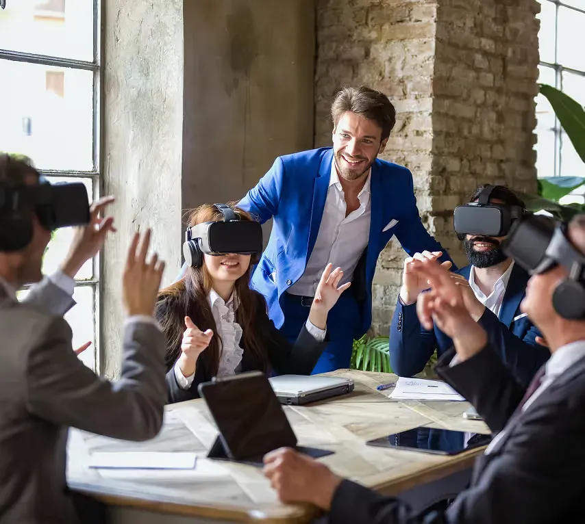 A team applauding during a breakout session